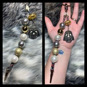 Credit card grabber or fancy roach clip. 🤷‍♀️